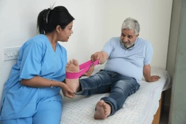 indian-female-physiotherapist-help-senior-260nw-2580442107